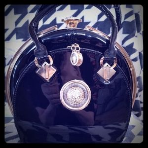 Black patent leather handbag